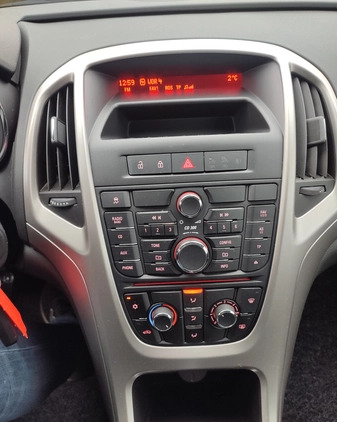 Opel Astra cena 24999 przebieg: 118000, rok produkcji 2011 z Puszczykowo małe 191